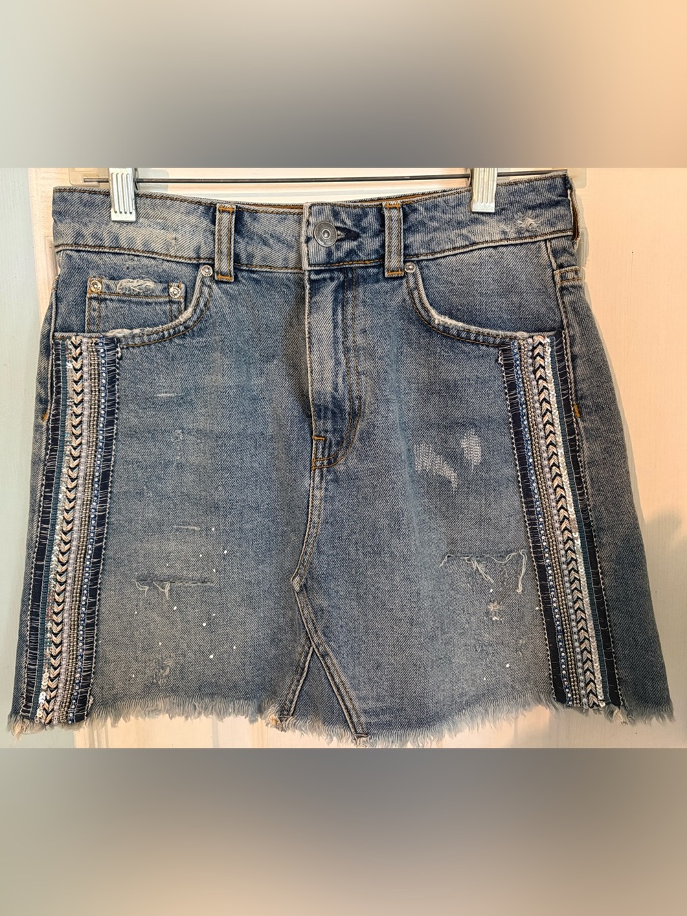 Free People Embellished &
Distressed Jean Skirt